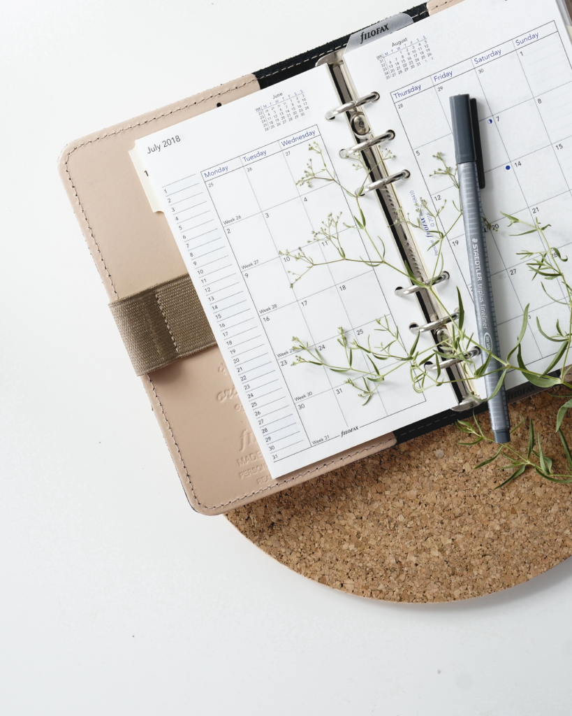 Image of a diary / planner with a pen